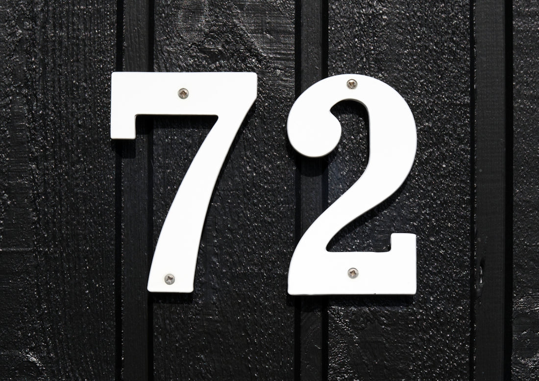 a number of white letters on a black surface