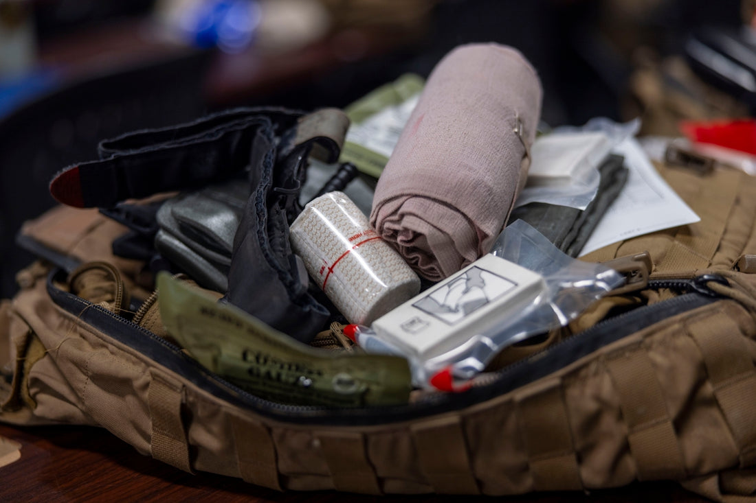 First aid kit contents with bandages and medical supplies