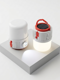 Two white and red portable lamps on a white platform with a white background