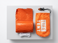 Orange life tent with packaging on a white background